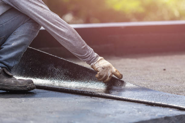 Professional Basement Waterproofing technician working in Williston, OH